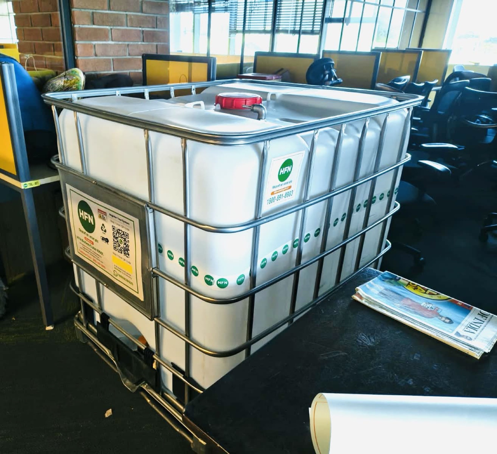 HFN BioGas Cube demonstration unit in an indoor setting
